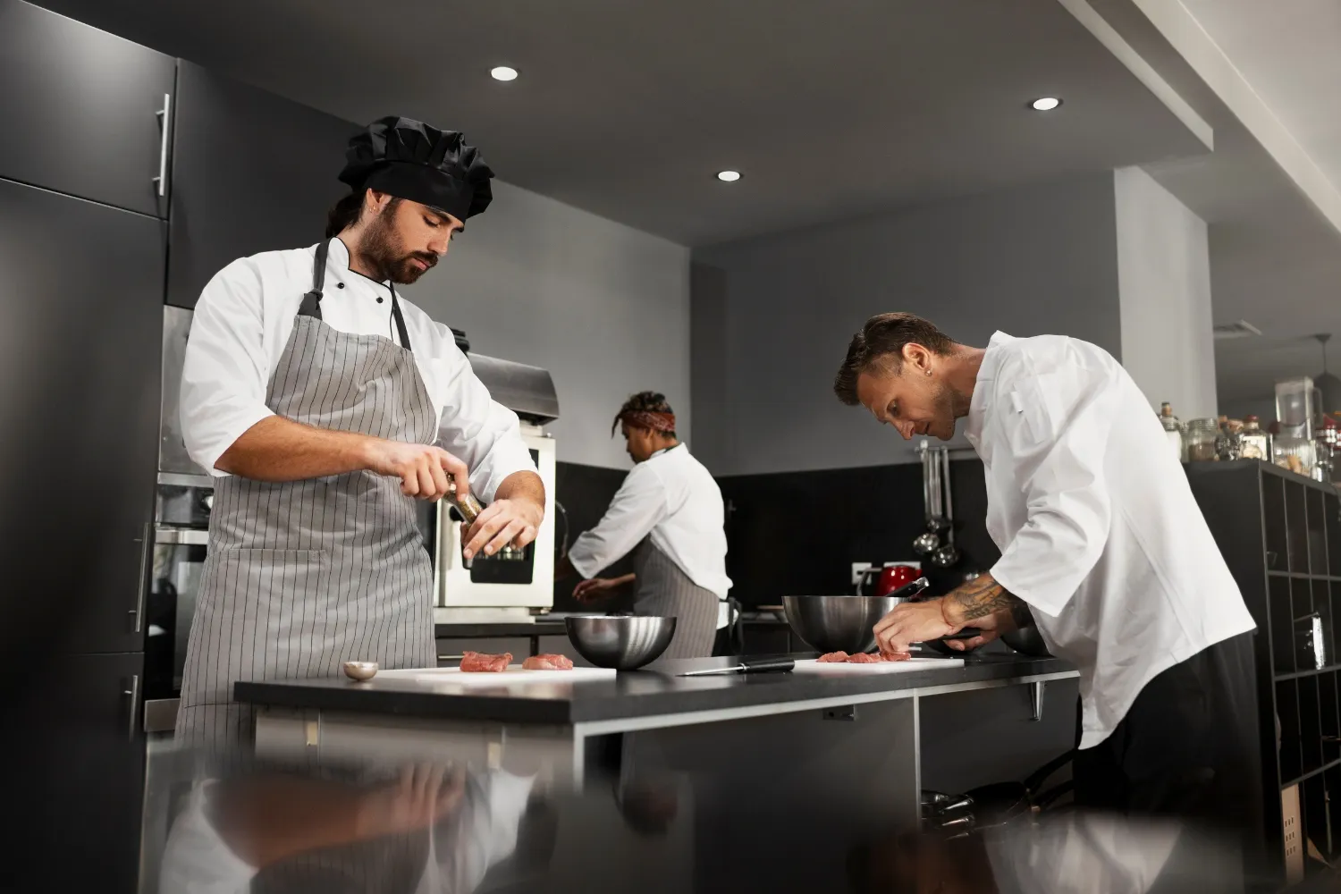Keeping up with the Latest Trends in Catering Equipment Chefs working together in a professional kitchen